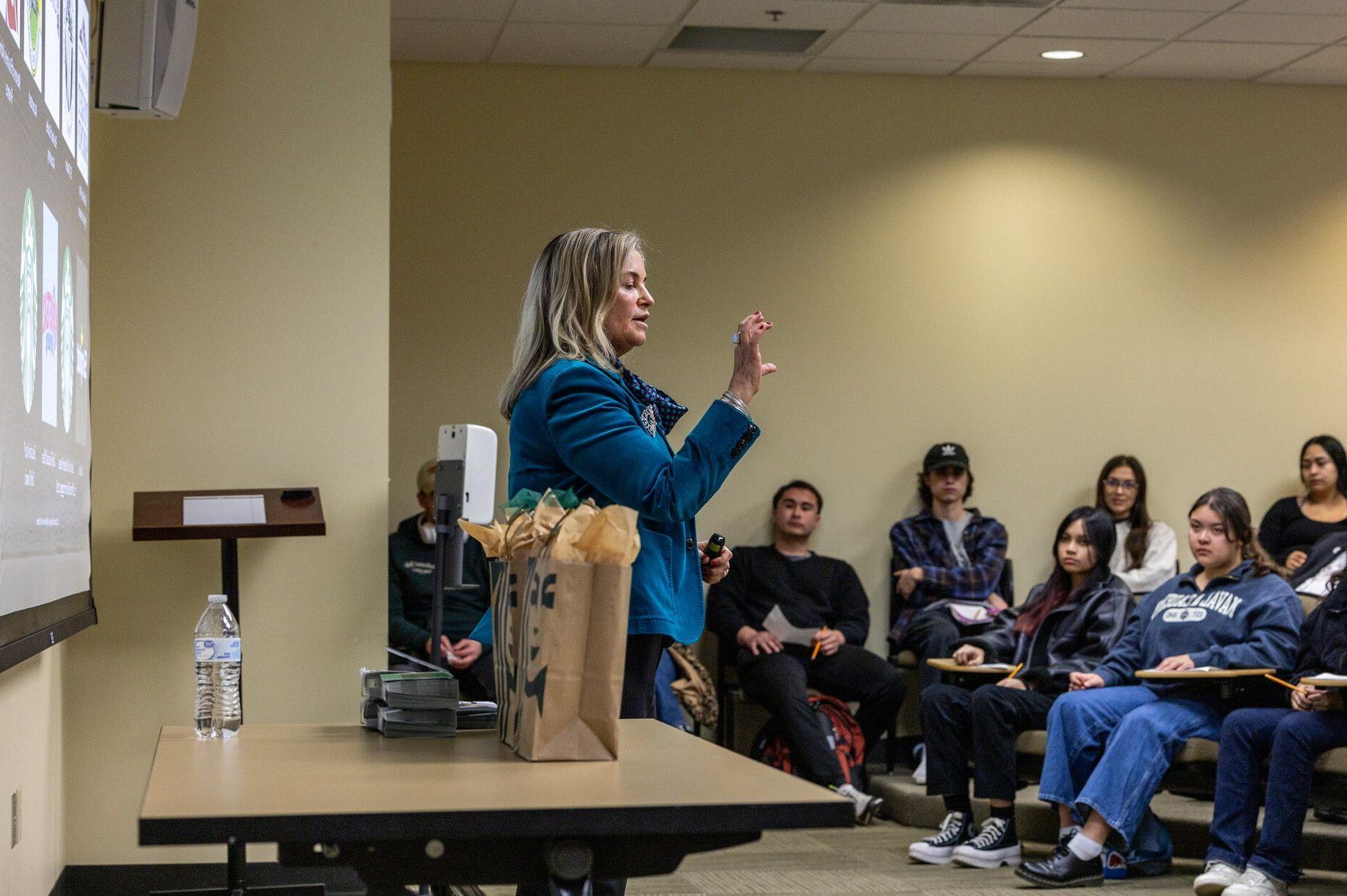 Rachel Ruggeri presenting to student audience 